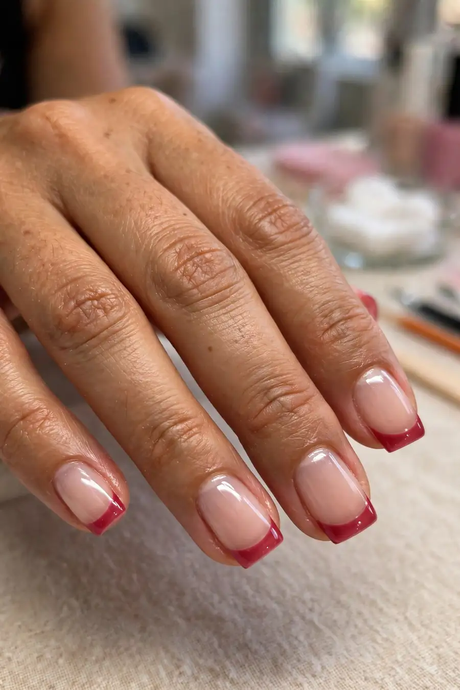 Raspberry jelly nails with jelly French tips on short square nails