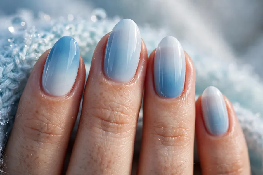 Icy blue to white ombre winter nails