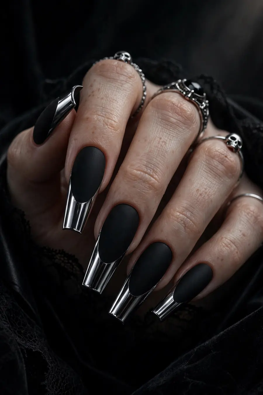Matte black gothic chrome nails with mirror chrome tips
