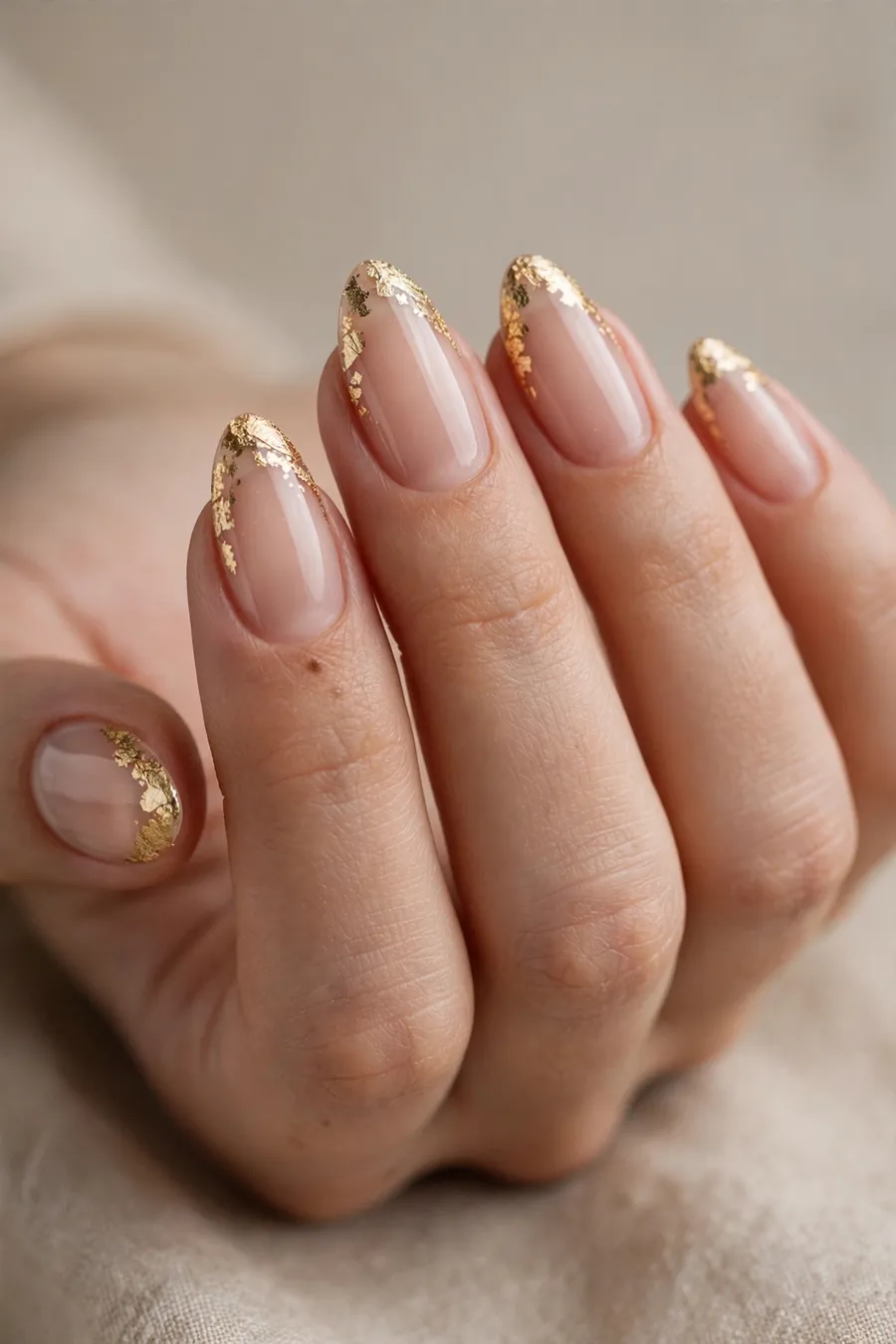 French tips with gold foil for New Year's Eve