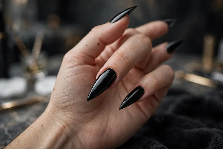 Black stiletto nails, edgy after-dark black nails