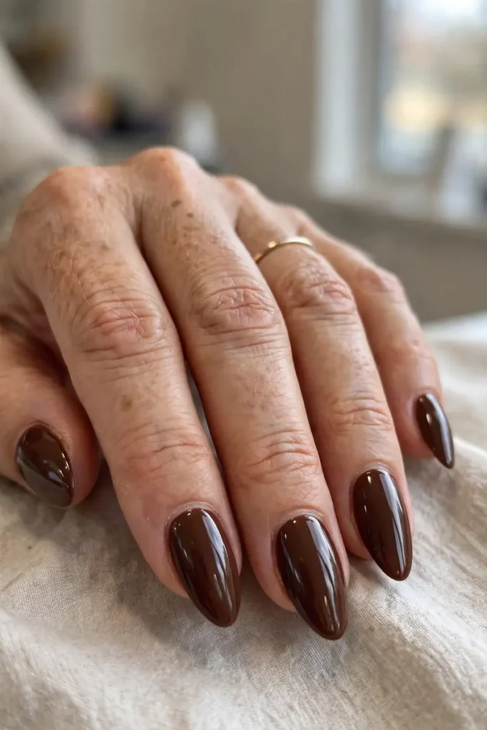 Glossy chocolate brown almond nails