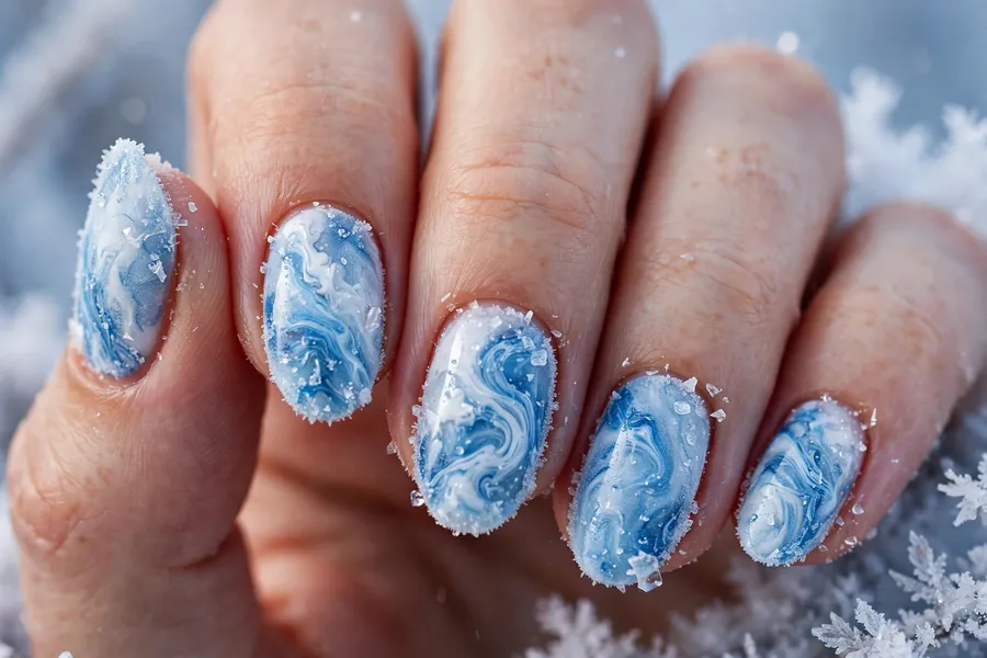 Frozen blue and white marble nails