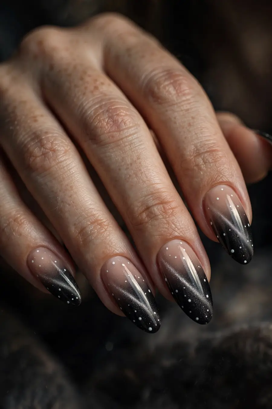 Gradient ombre polka dot cat eye nails fading nude to black with white dots