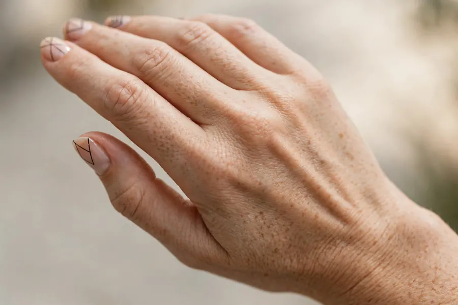 Negative space line short nail designs on real hands