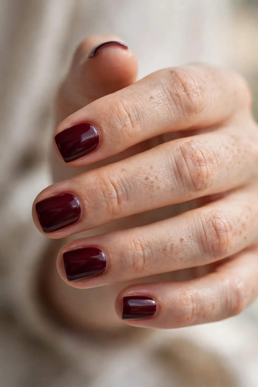 Short square nails in deep pinot noir burgundy