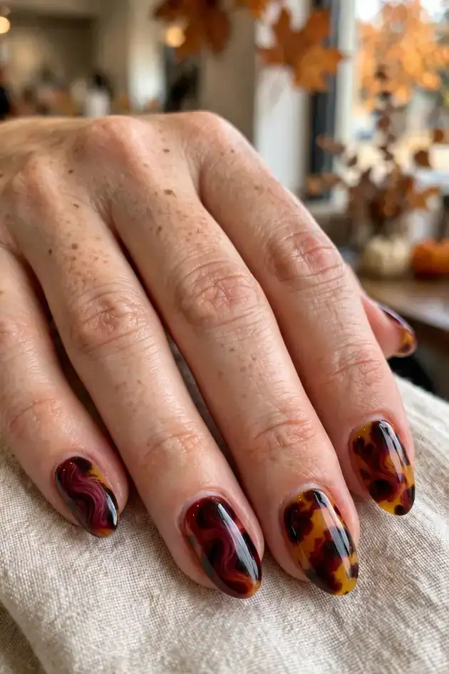 Deep red wine tortoiseshell nails