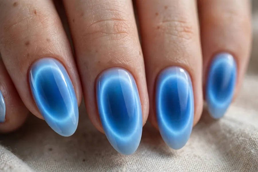 Blue aura gradient winter nails