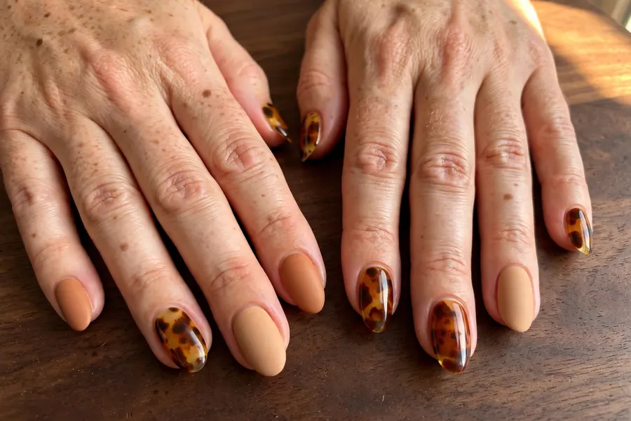 Terracotta tortoiseshell mix earthy nails on real hands