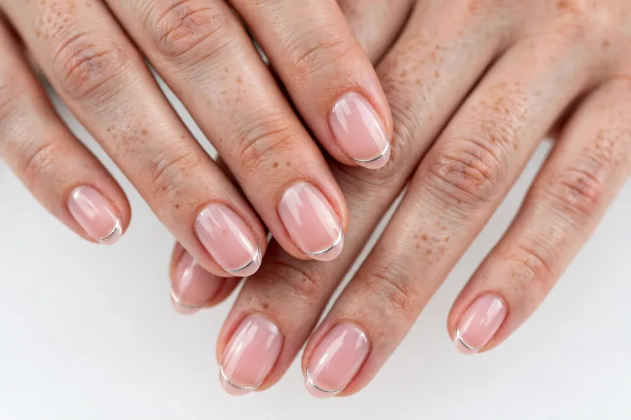 Micro french jelly pink nails with ultra-thin chrome tips