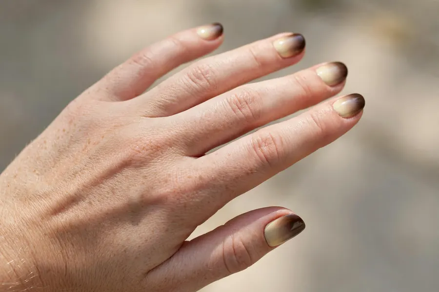 Coffee latte short nail designs on real hands