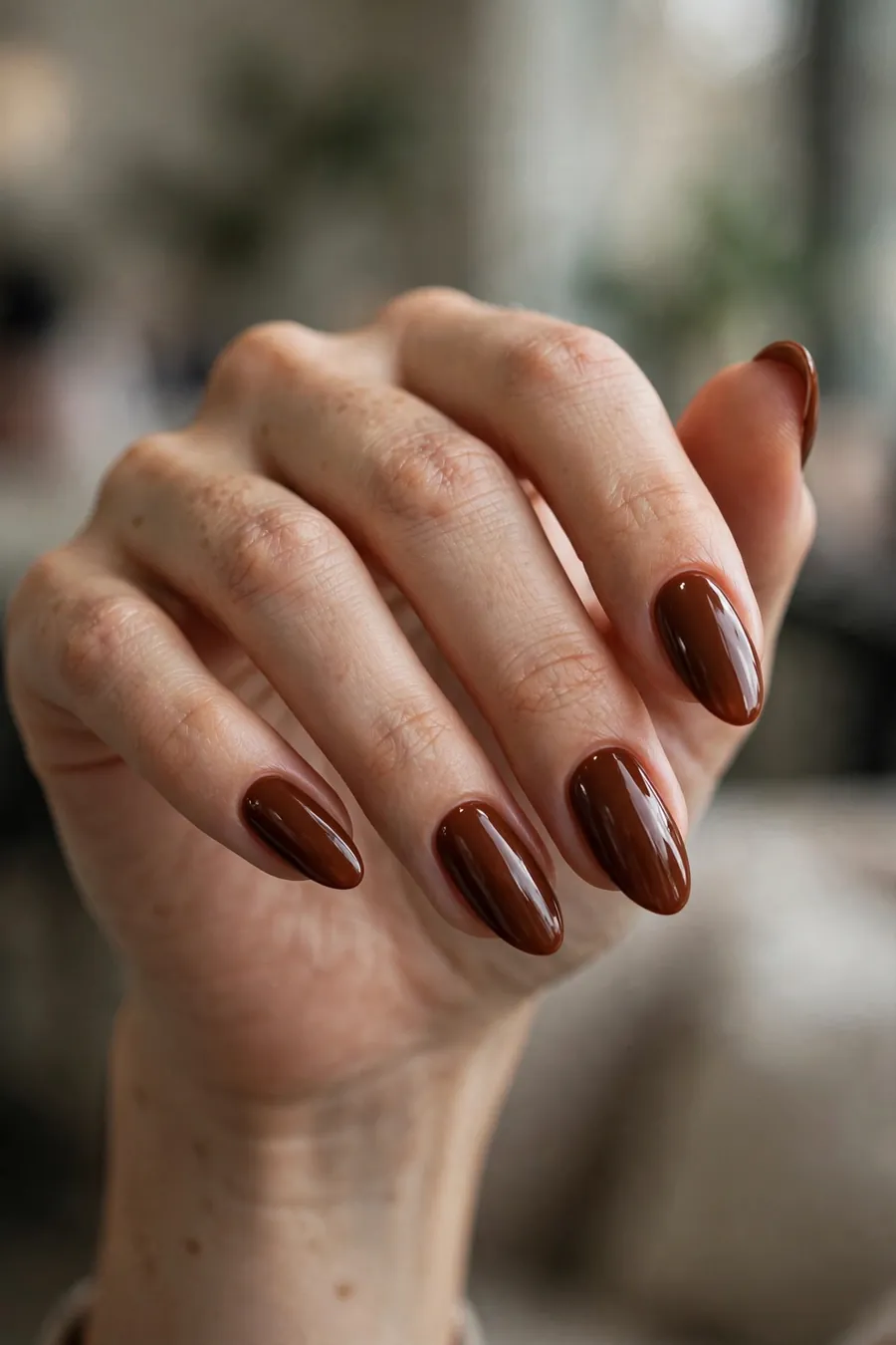 Deep burnt caramel nude nails, moody rich glossy brown