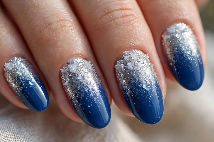Blue nails with frozen glitter fade