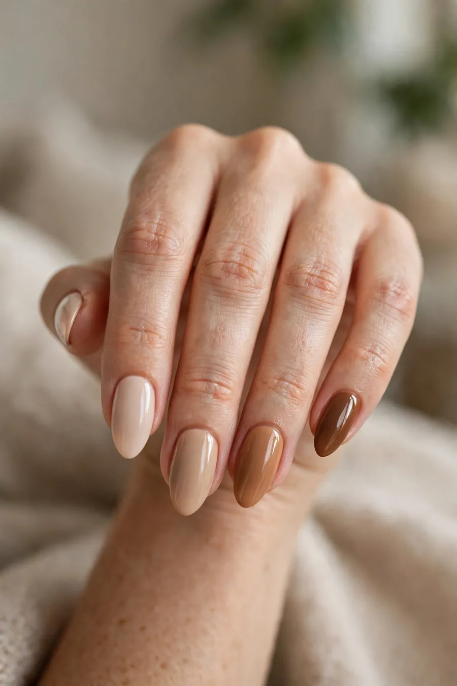 Mix and match caramel nude nails, each nail a different caramel tone
